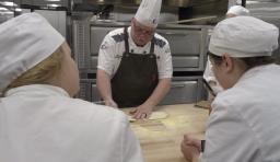 A chef teaches students