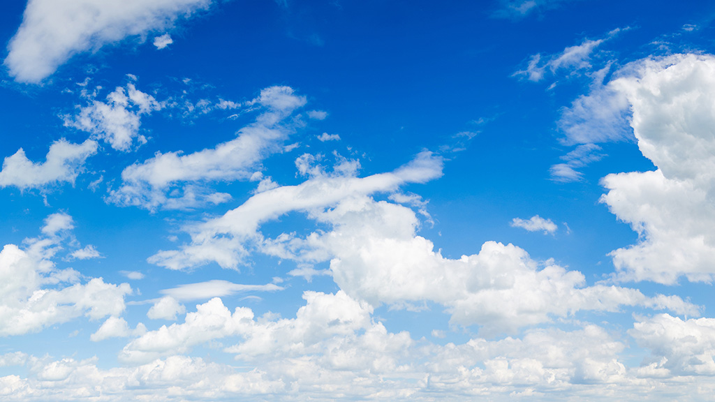 A picture of a blue sky and white clouds